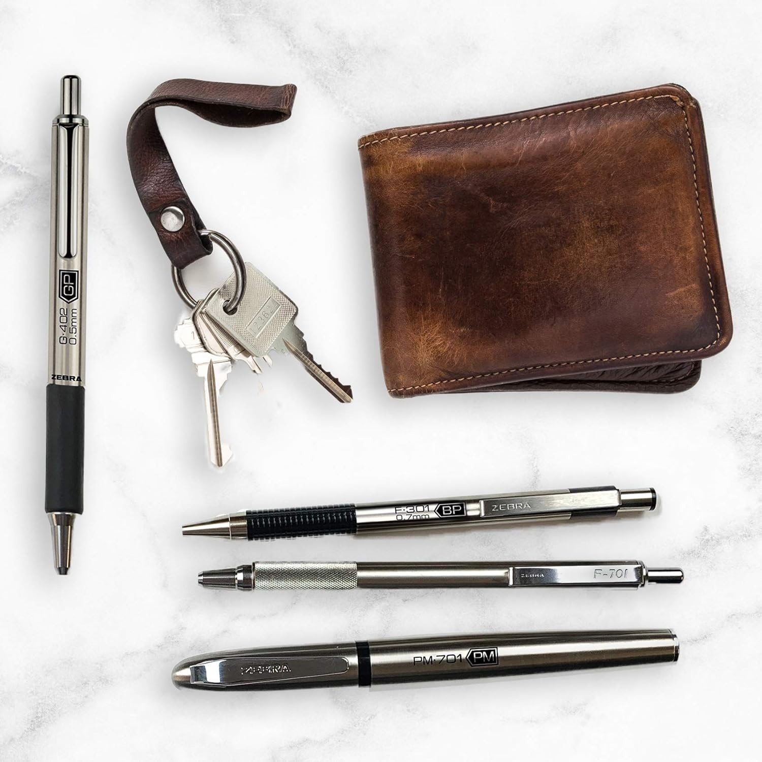 image:imageZebra Pen G301 Signature Series Retractable Gel Pen 05mm Fine Point Stainless Steel Barrel with Textured Grip Assorted Vintage Ink Colors Indigo Butterscotch Cherrywood and Plum 4Pack 47304Black D